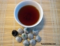 Preview: Geschenk: China Mini Tuo Cha 15 J. alt - 10 Stck in Schachteln 45 g.